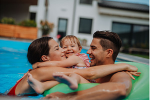 Parents and child having fun with
