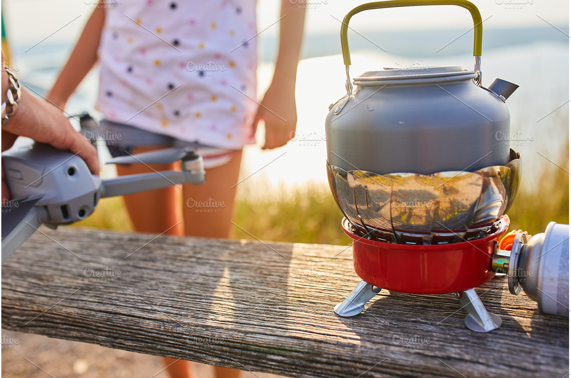 Outdoor cooking setup with portable, a Nature Photo by IlliaBondarPhotography
