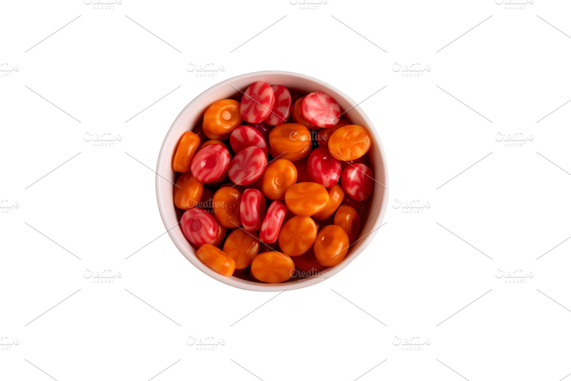 Top view of a white bowl filled with vibrant red and orange hard, a Food & Drink Photo by Ales Munt