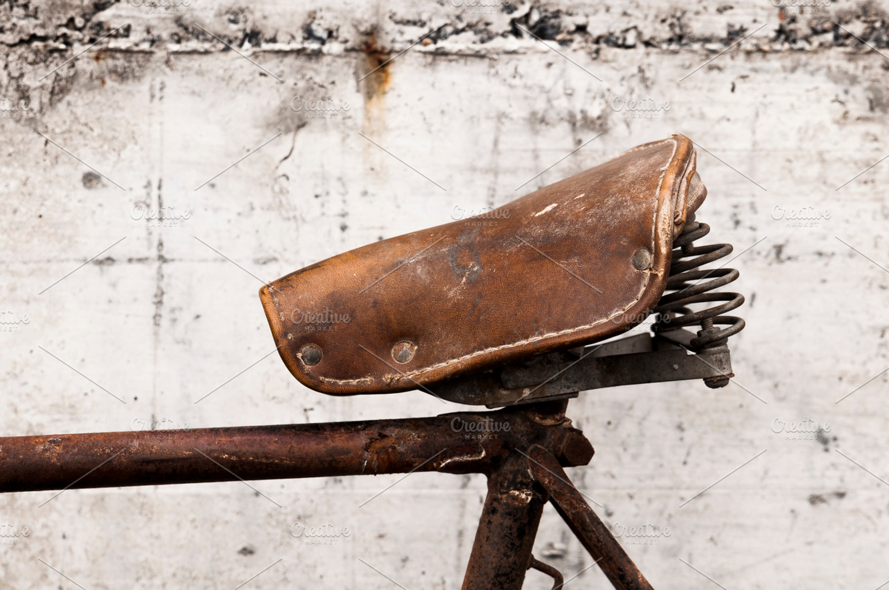 Antique or retro bicycle saddle, a Transportation Photo by Irantzu Arbaizagoitia