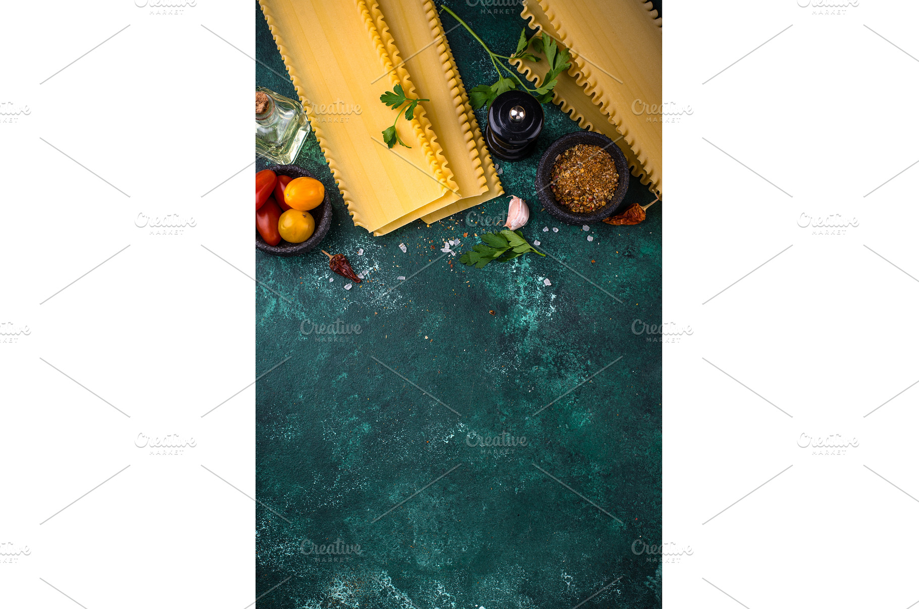 Uncooked lasagna pasta with cooking, a Food & Drink Photo by Yulia Furman