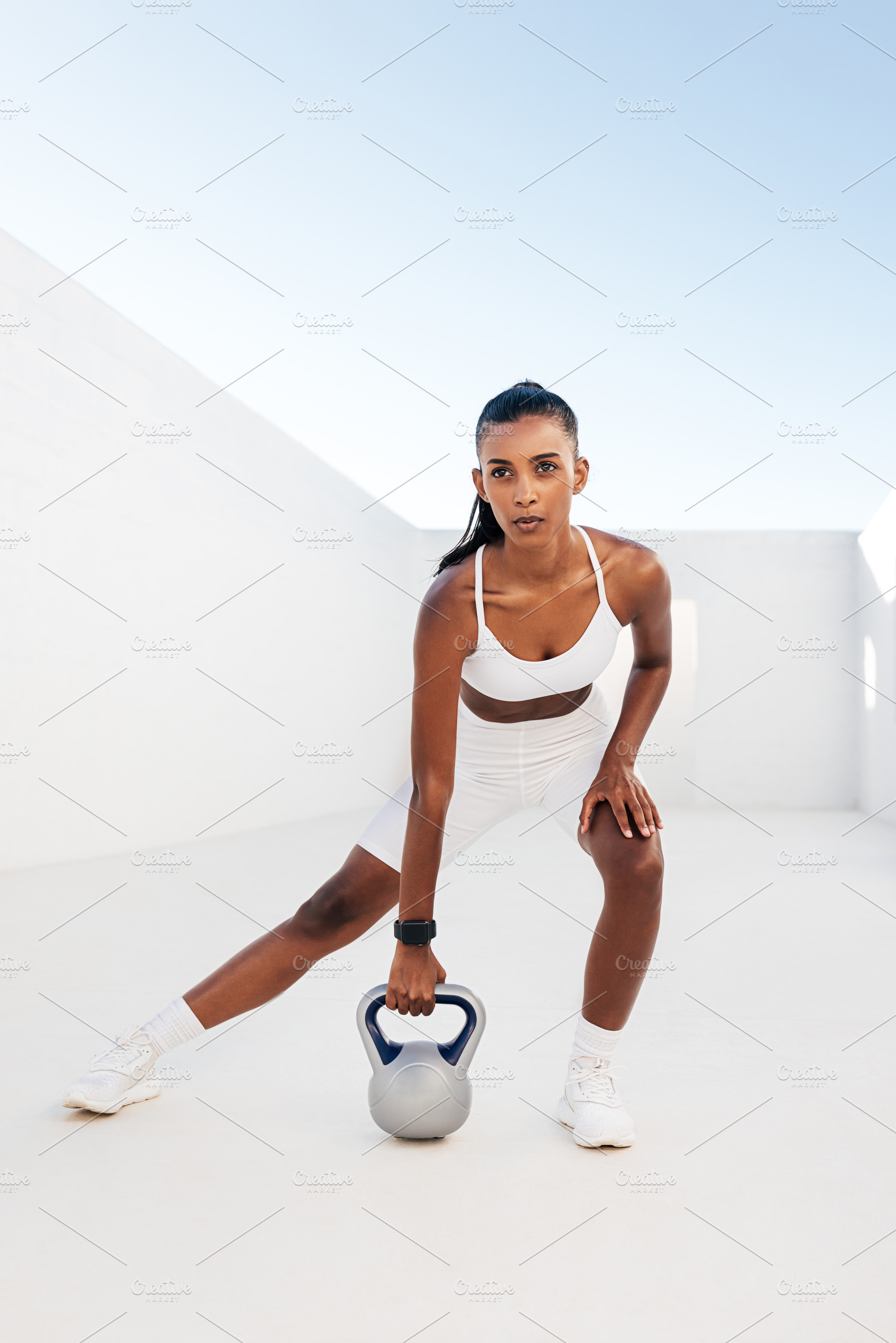 Sportswoman with kettlebell, a Sports & Recreation Photo by Artem Varnitsin