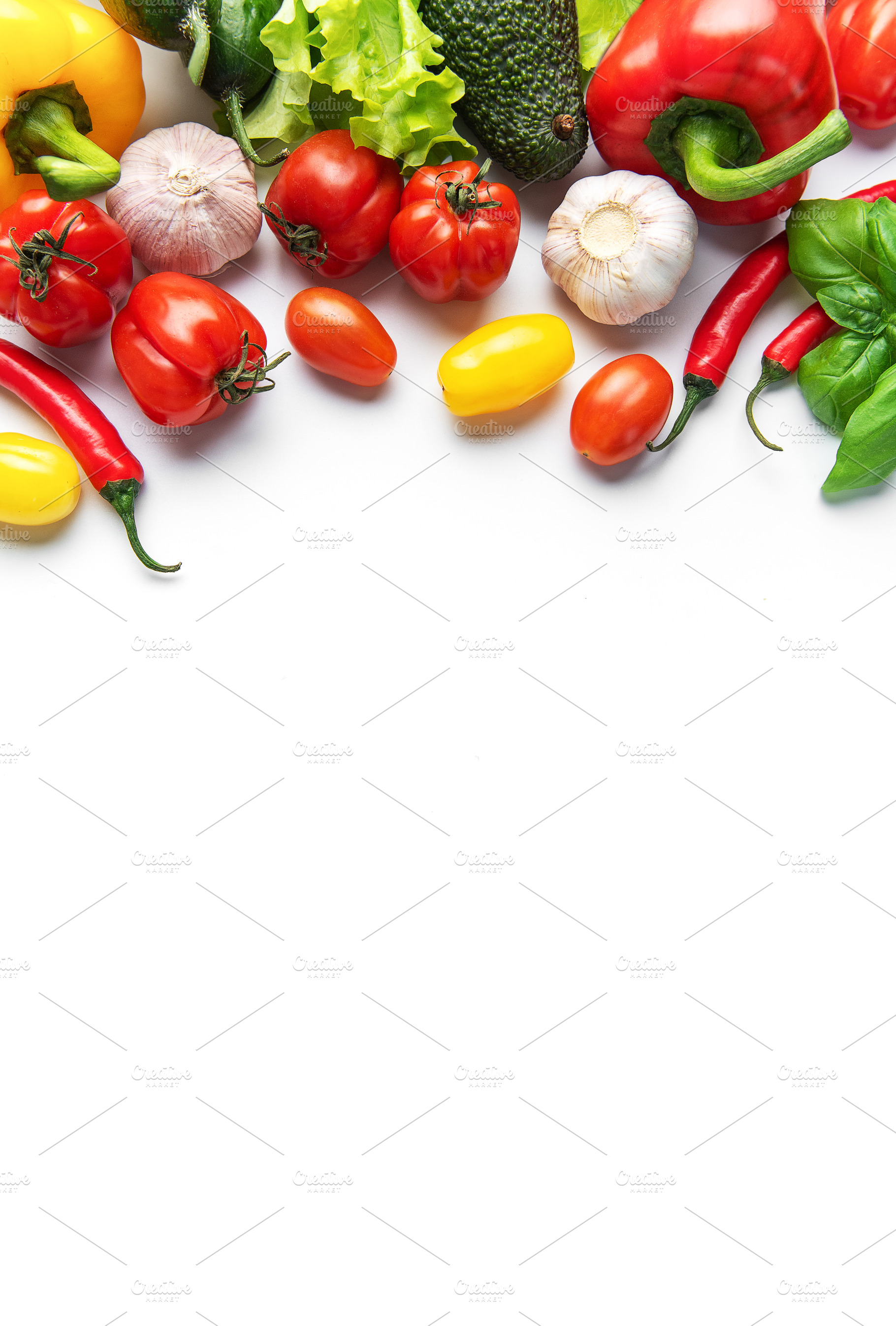 Fresh healthy eating vegetables on white background, a Food & Drink Photo by Olena Rudo