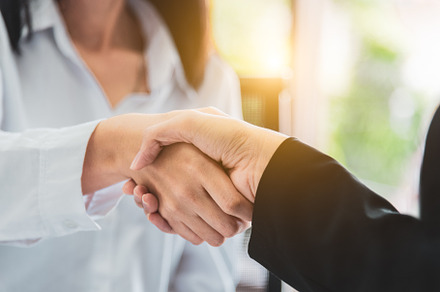 Close up of business people shaking hands after finish reach agr, a Person Photo by Ministocker
