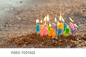 Birthday candles burning seashore stock photo containing happy birthday and, an Arts & Entertainment Photo by Grey Coast Media