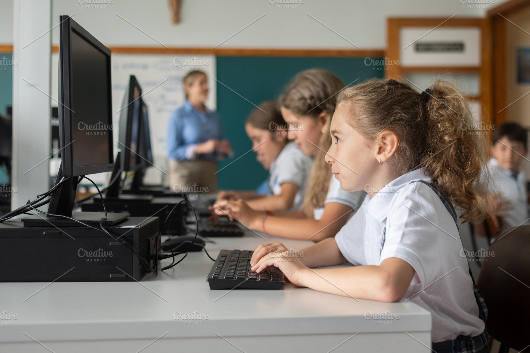Elementary School girls using deskop, a School & Education Photo by etorres69