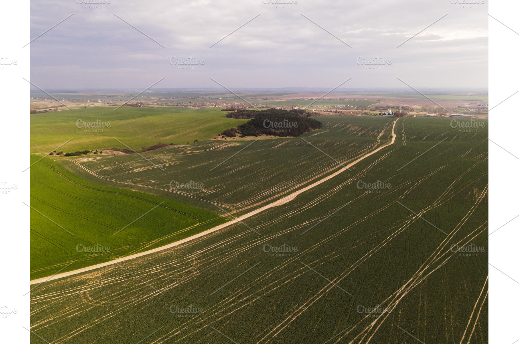 Aerial view of rolling green, a Nature Photo by volodymyrshtun13795