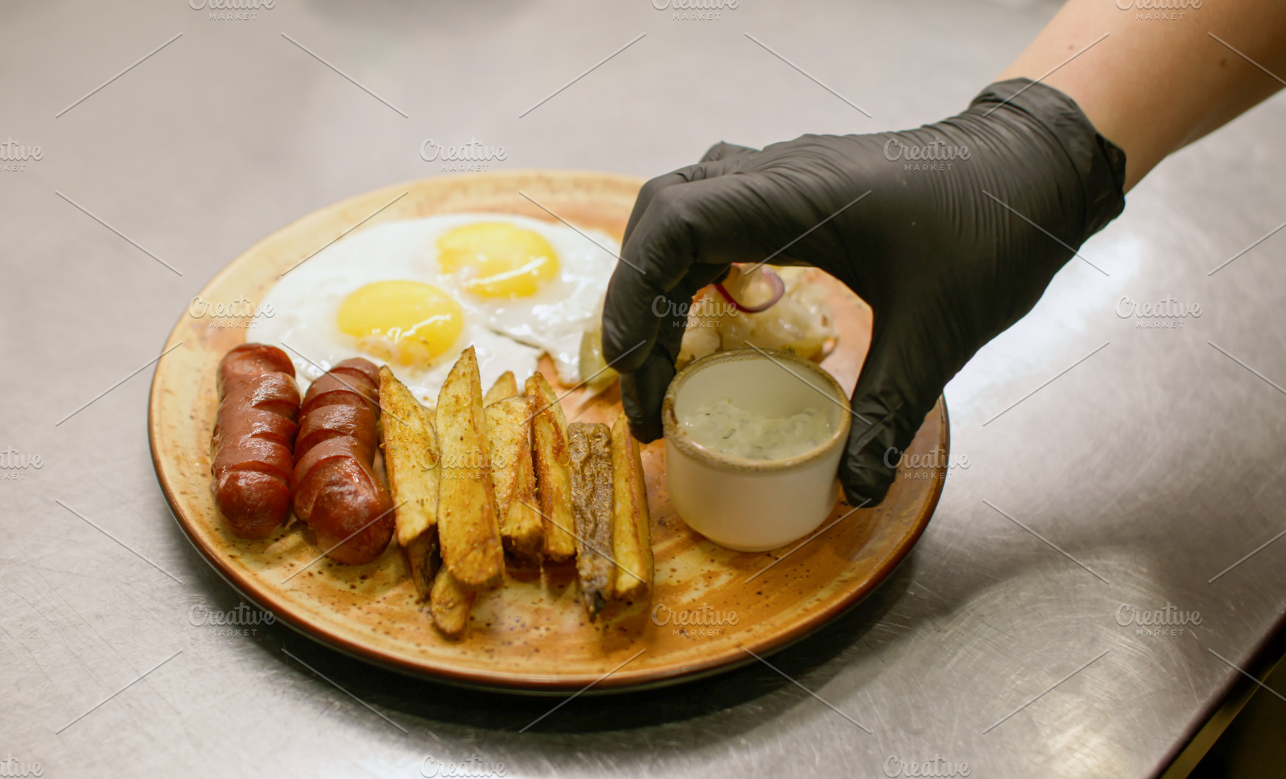 Serving lunch meal plate fried egg sausages chef, a Food & Drink Photo by Photo Drive Studio