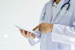 Doctor working with tablet.