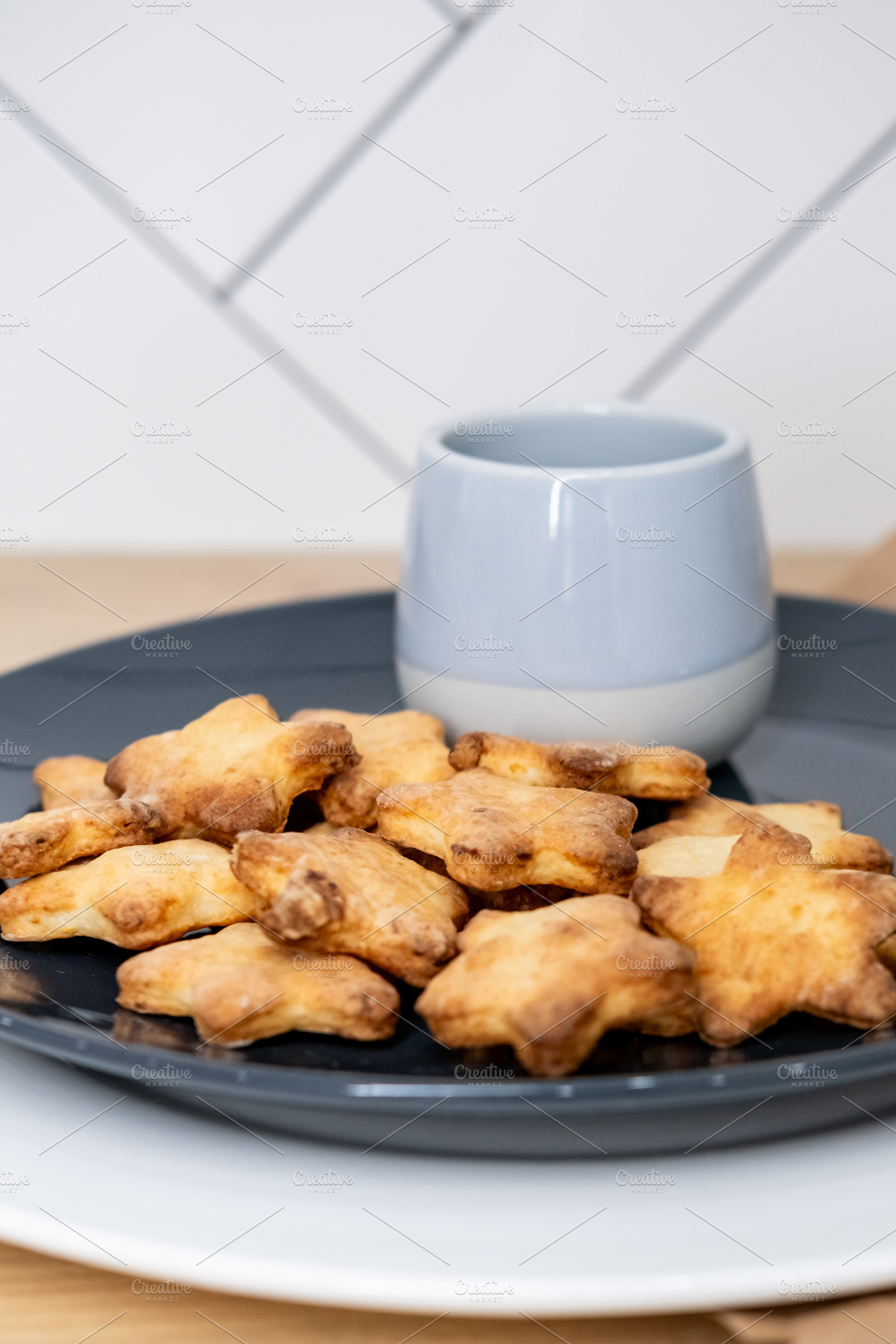 Sweet snack cookies plate star treat background, a Food & Drink Photo by Photo Drive Studio