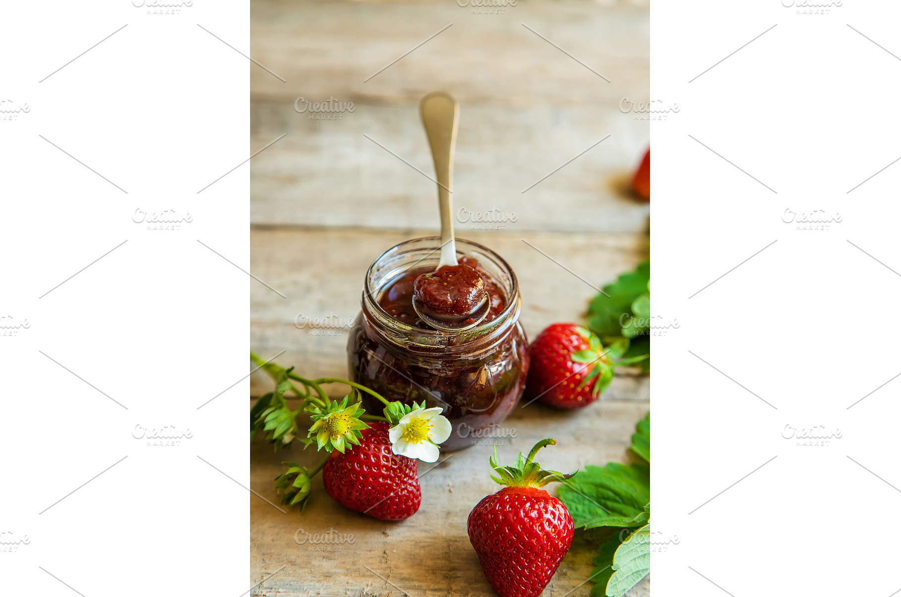 Homemade strawberry jam in a jar, a Food & Drink Photo by yanadjana
