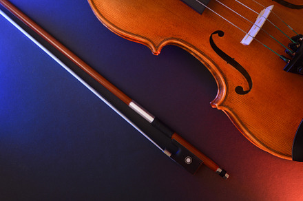 Violin on black background with red and blue lights top view, an Arts & Entertainment Photo by Davizro's Market