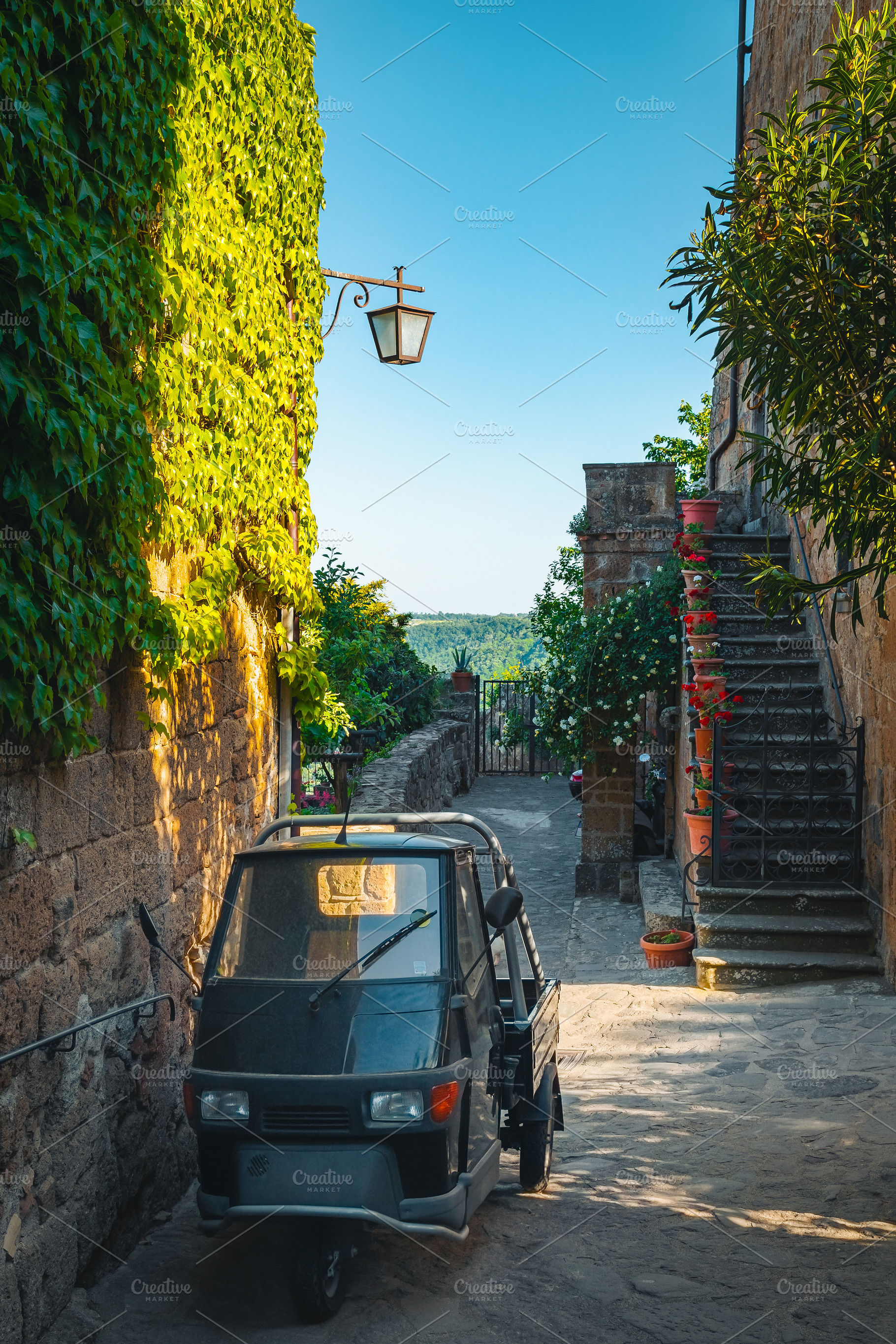 Parked small old vehicle in the city, a Transportation Photo by Alpine Dreams