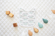Bib Flatlay Mockup #14, a Product Mockup by JENLYNN Stock Shop (Thumbnail 1 of 8)