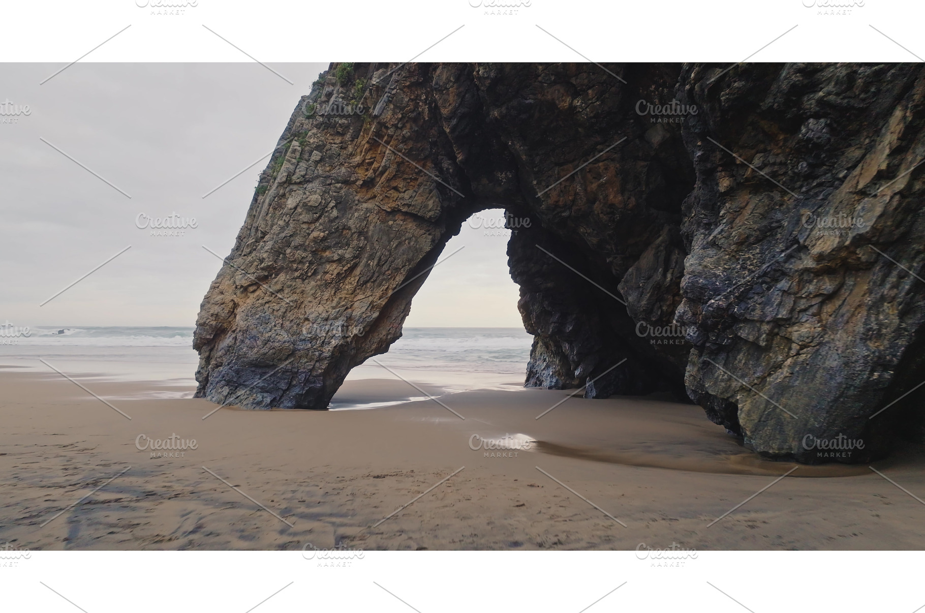 Praia da Adraga beach rock arch, a Nature Photo by Goinyk