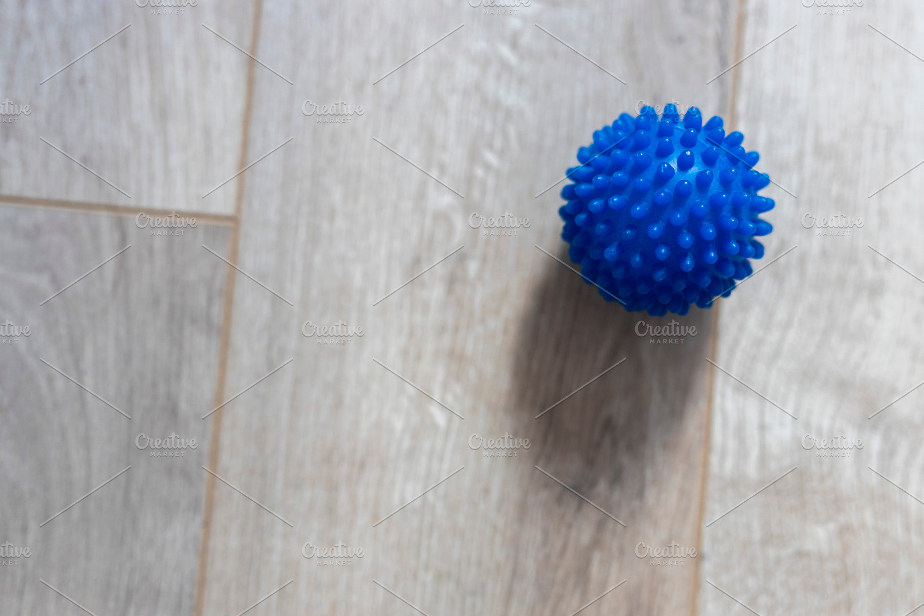 Single blue spiky massage ball for p, an Abstract Photo by Imaginarium