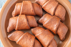 Fresh chocolate croissants, a Food & Drink Photo by Alexander Prokopenko