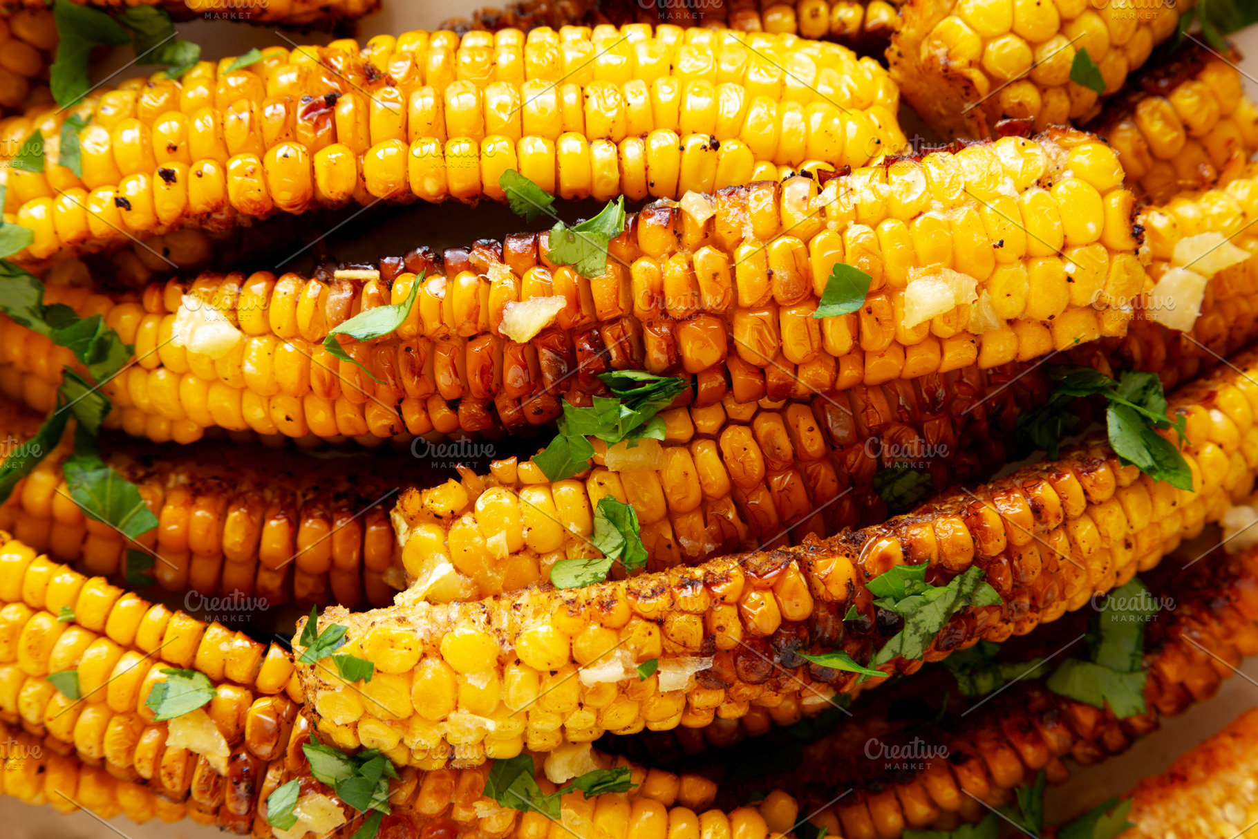 Homemade Spicy Corn Ribs with Mayo on a Plate, top view. Close-u, a Food & Drink Photo by LiudmylaChuhunova