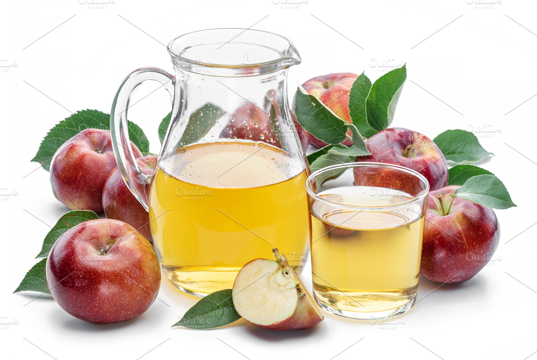 Glass and carafe of fresh apple juice and organic apples isolate, a Food & Drink Photo by Volff