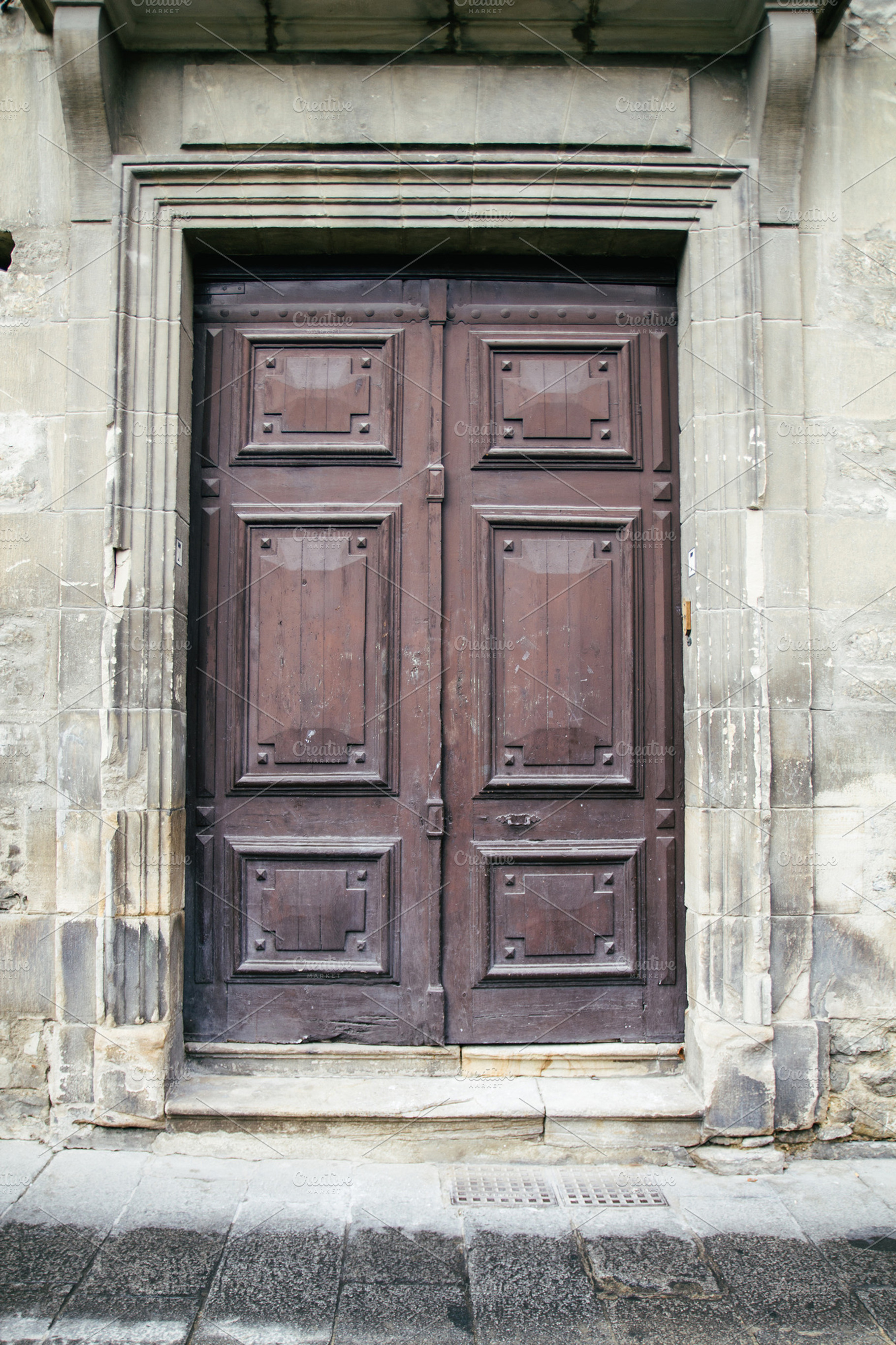 Old door in a street, a Photo by Am.Benitez Estudio