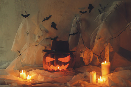 Happy Halloween! Spooky Jack o lantern carved pumpkin, spider we, a Holiday Photo by Sonjachni