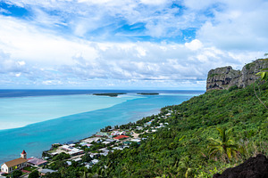 Aerial view of Vaiea village and church in Maupiti, French Polyn, a Photo by GoodGoods