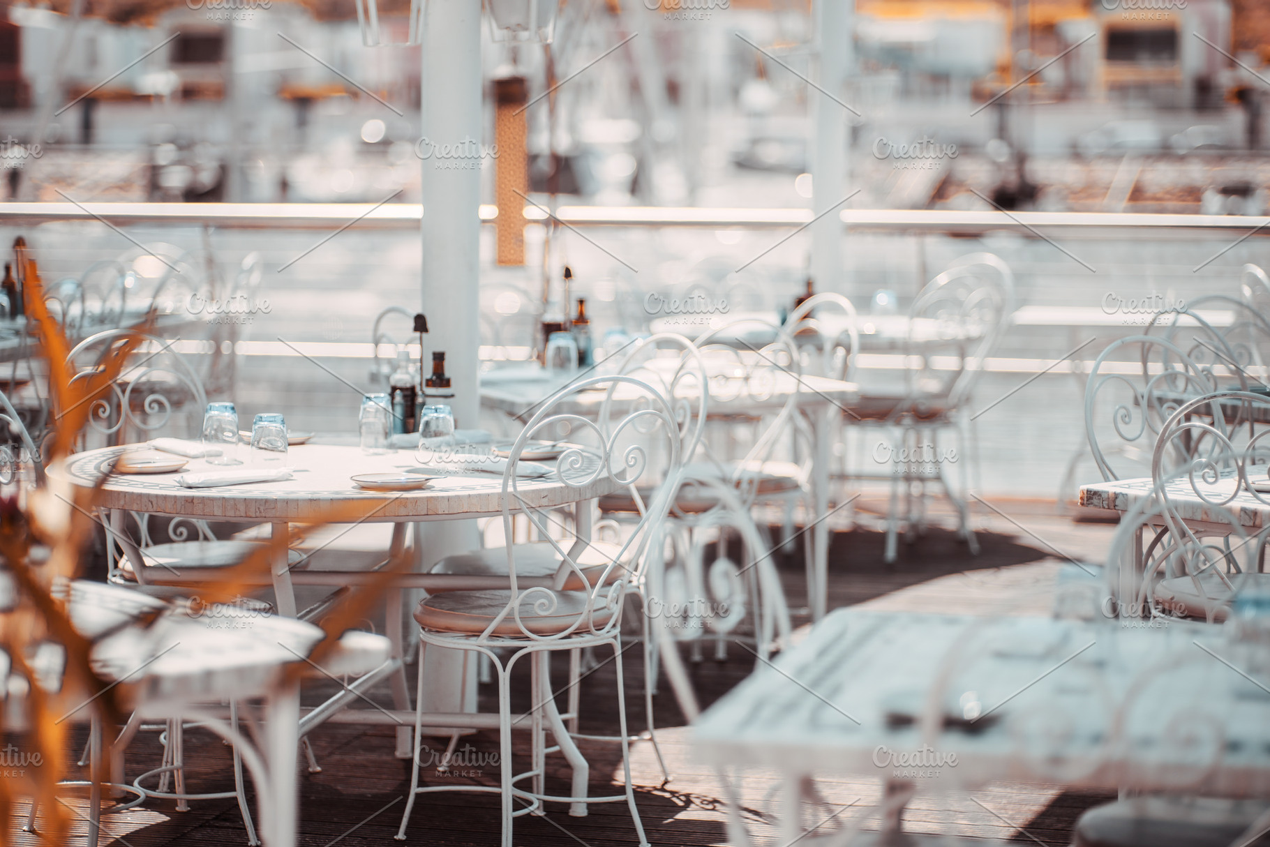 Sunlit Marina Restaurant Terrace, an Industrial Photo by SkyNext