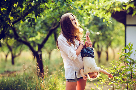 mom and little girl having fun, a Person Photo by Tekso