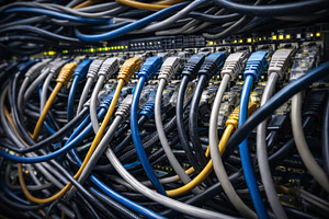 Network cables in a server data cent, a Photo by Dvoevnore photos