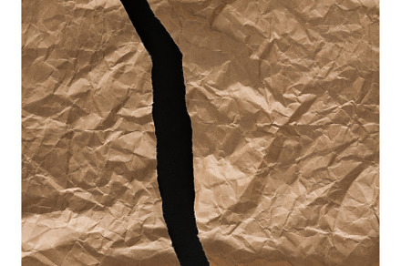 Crumpled and torn craft wrapping, an Abstract Photo by Prostock-Studio