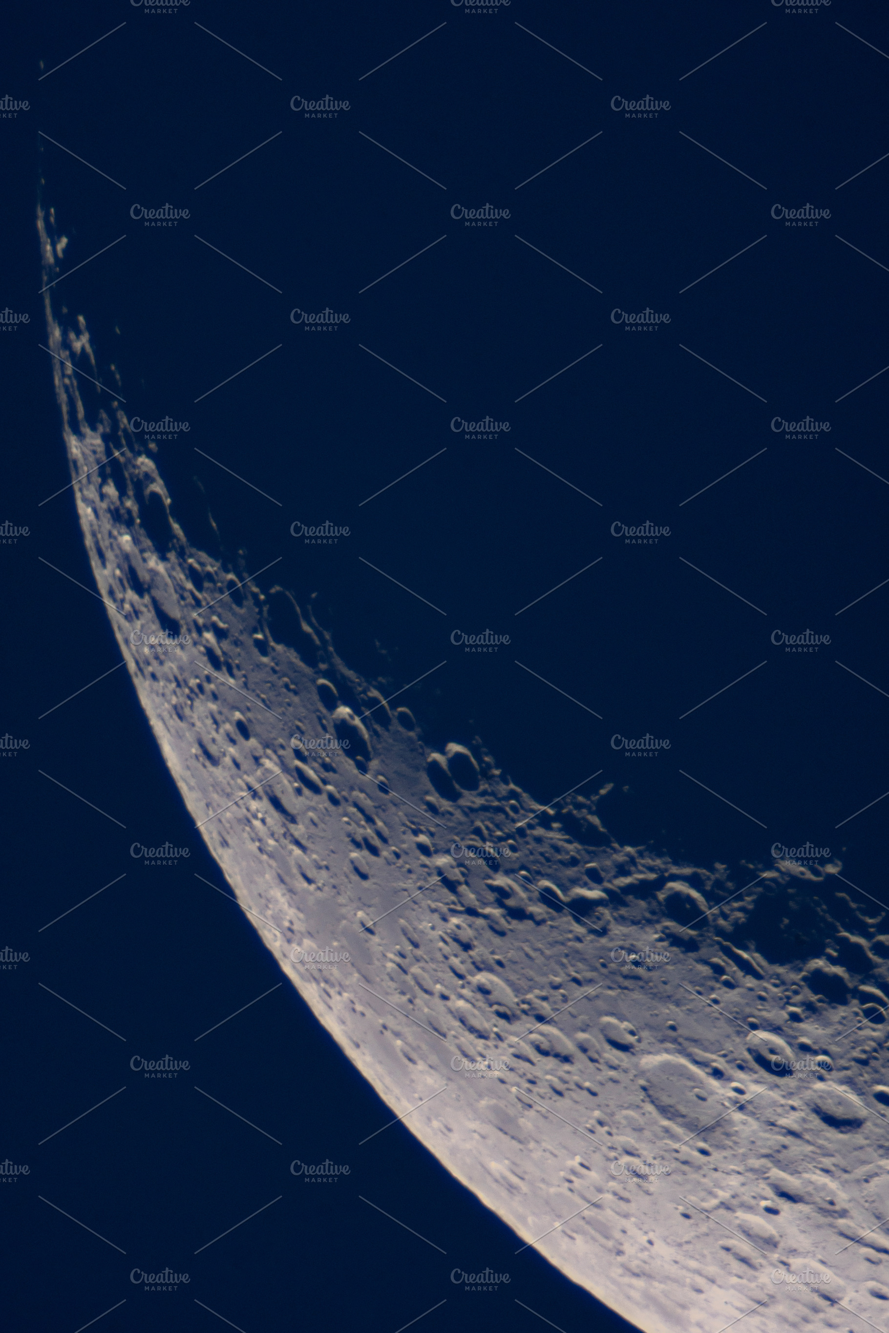 Rugged crescent Moon limb with crate, a Wallpaper Photo by Elena Vagengeim