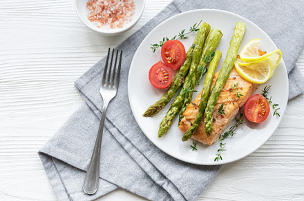 Baked Delicious salmon, green asparagus on  plate, a Food & Drink Photo by Olena Rudo