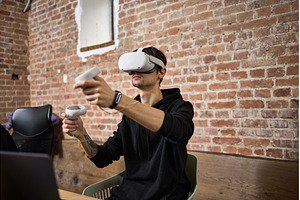 Man immersed in virtual reality with, a Technology Photo by wip3out