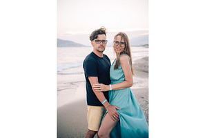 Happy Couple Embracing on a Sandy, a Person Photo by Jan Jack Russo Media