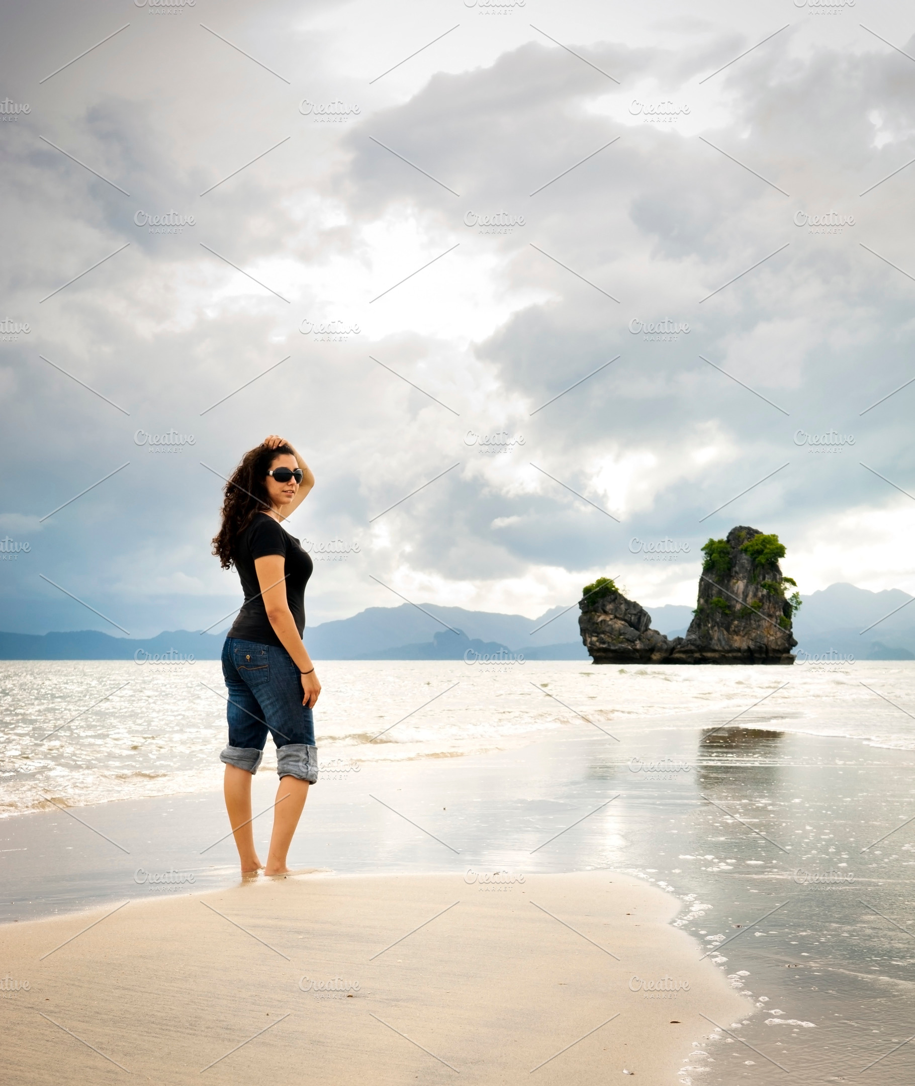 Young Woman Beach Walking, a Person Photo by THP Creative