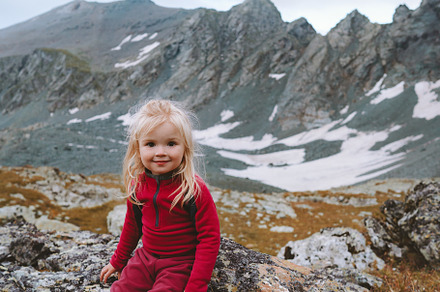 Child girl walking in mountains barefoot happy smiling face family vacations hi, a Person Photo by e v e r s t