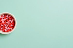 Valentine candy hearts in a bowl on, a Photo by Dvoevnore photos