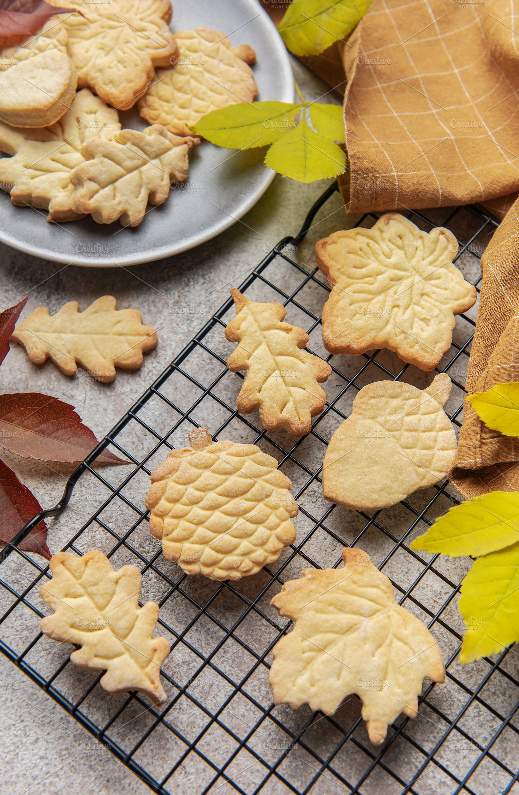 Homemade autumn cookies baking on cooling rack, a Food & Drink Photo by Olena Rudo