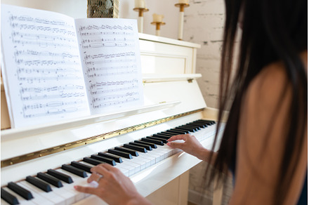 A girl playing the piano, a School & Education Photo by undrey