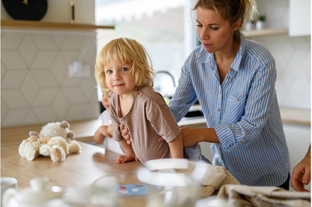 Mom and kids making pancakes, a Person Photo by HalfPoint