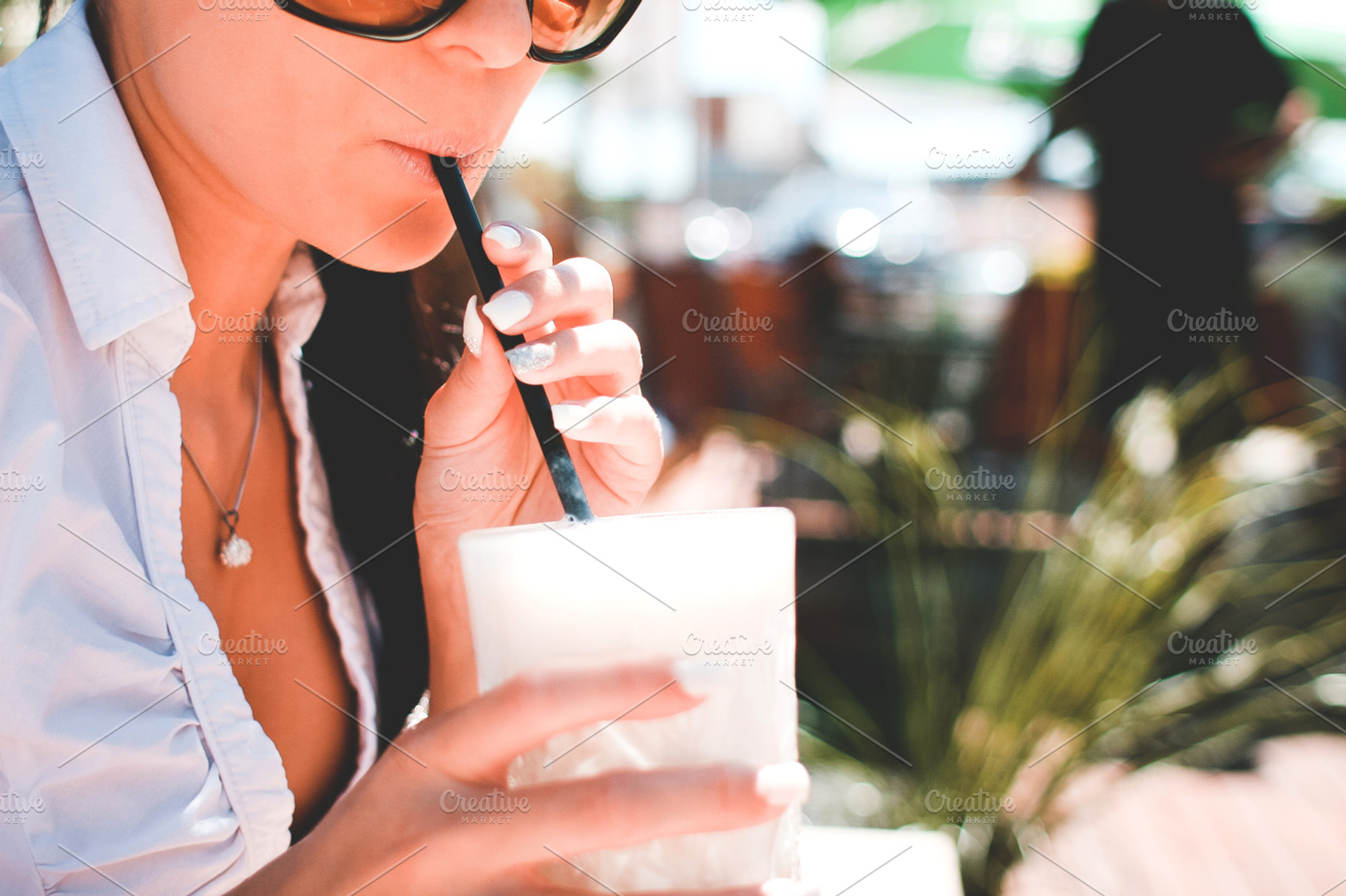 Girl drinking milkshake drink stock photo containing drink and drinking