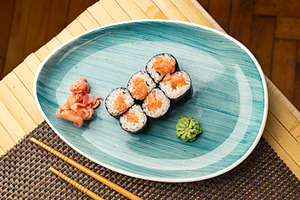 Fresh hosomaki rolls, filled with salmon, a Photo by Grafvision photography