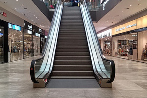 Escalator in modern shopping center, a Photo by Beautiful things