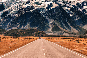 Road to the mountains containing mountain, road, and snow