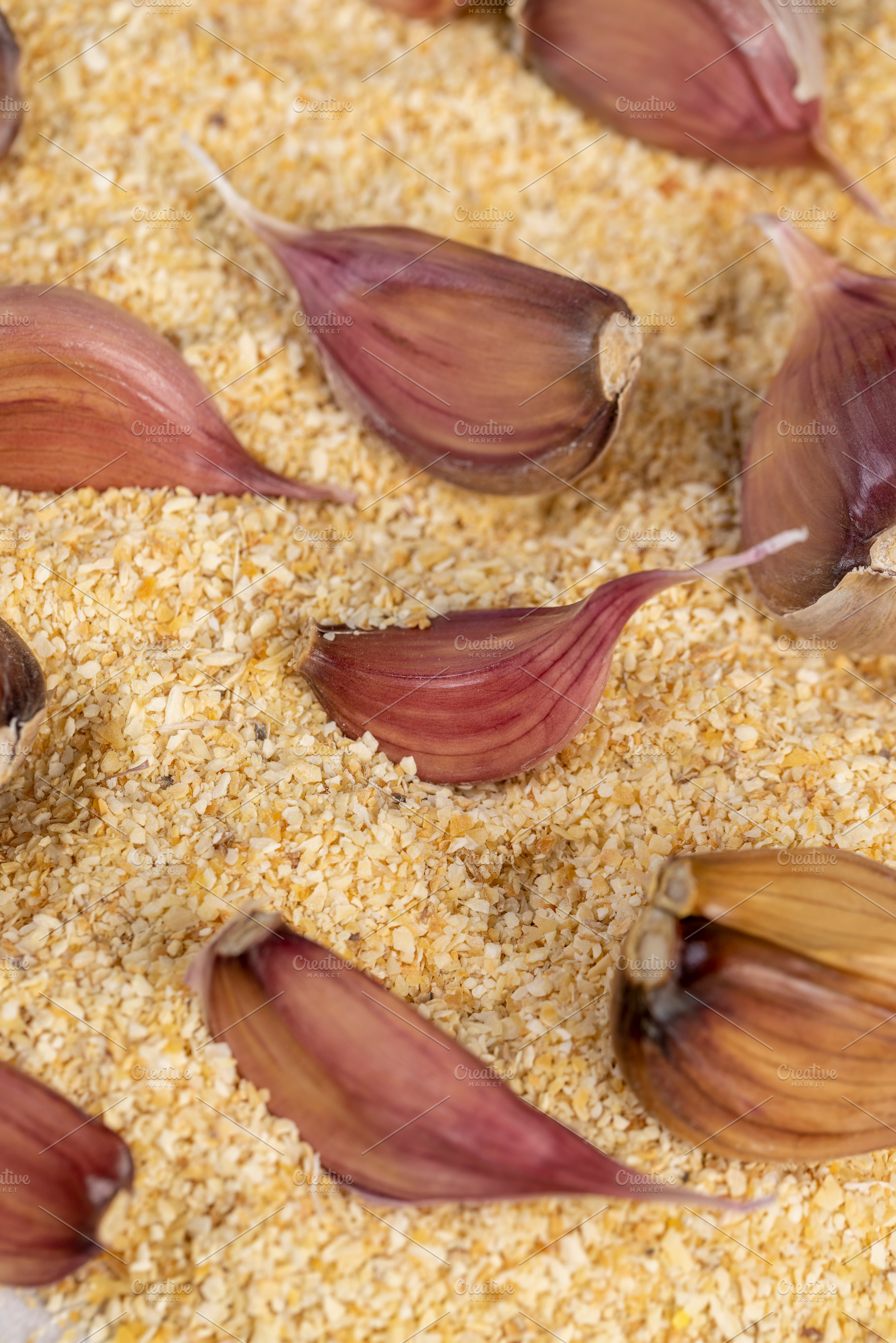 garlic fruits for cooking close up, dried spices from very small pieces of garl, a Photo by rsoollAI