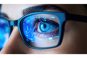 Close-up of smart glasses reflecting, a Technology Photo by Igor Tichonow