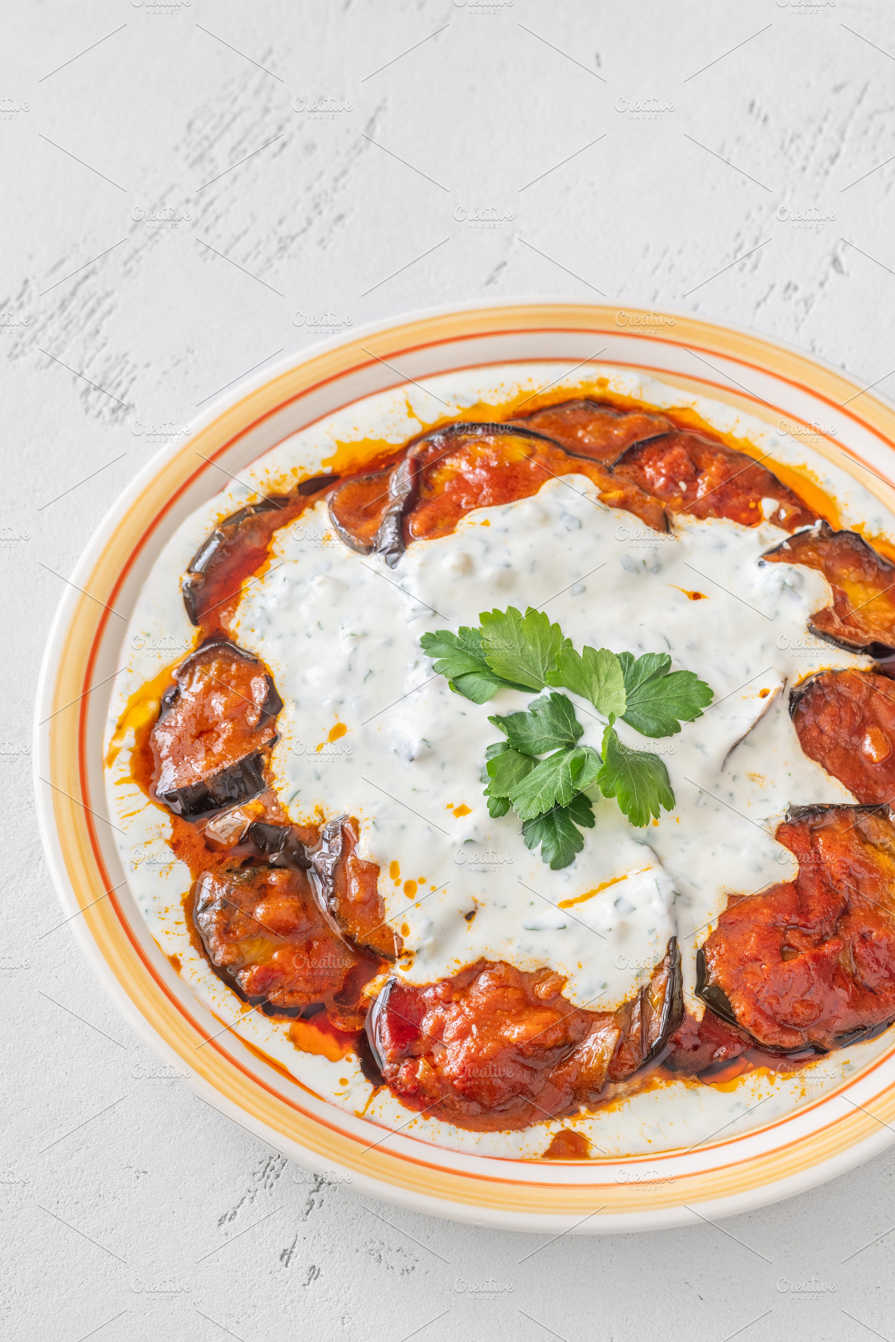 Burani Bonjan Afghan eggplant dish with yogurt garlic sauce and, a Food & Drink Photo by Alexander Prokopenko