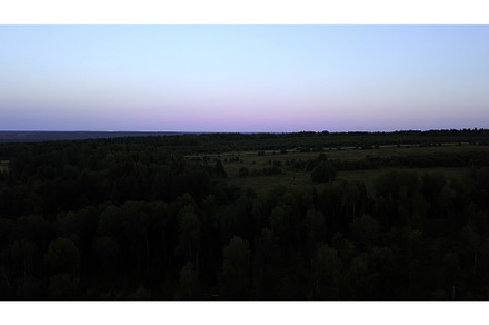 Aerial view and a sunset over meadow, a Nature Photo by Media Whale Stock