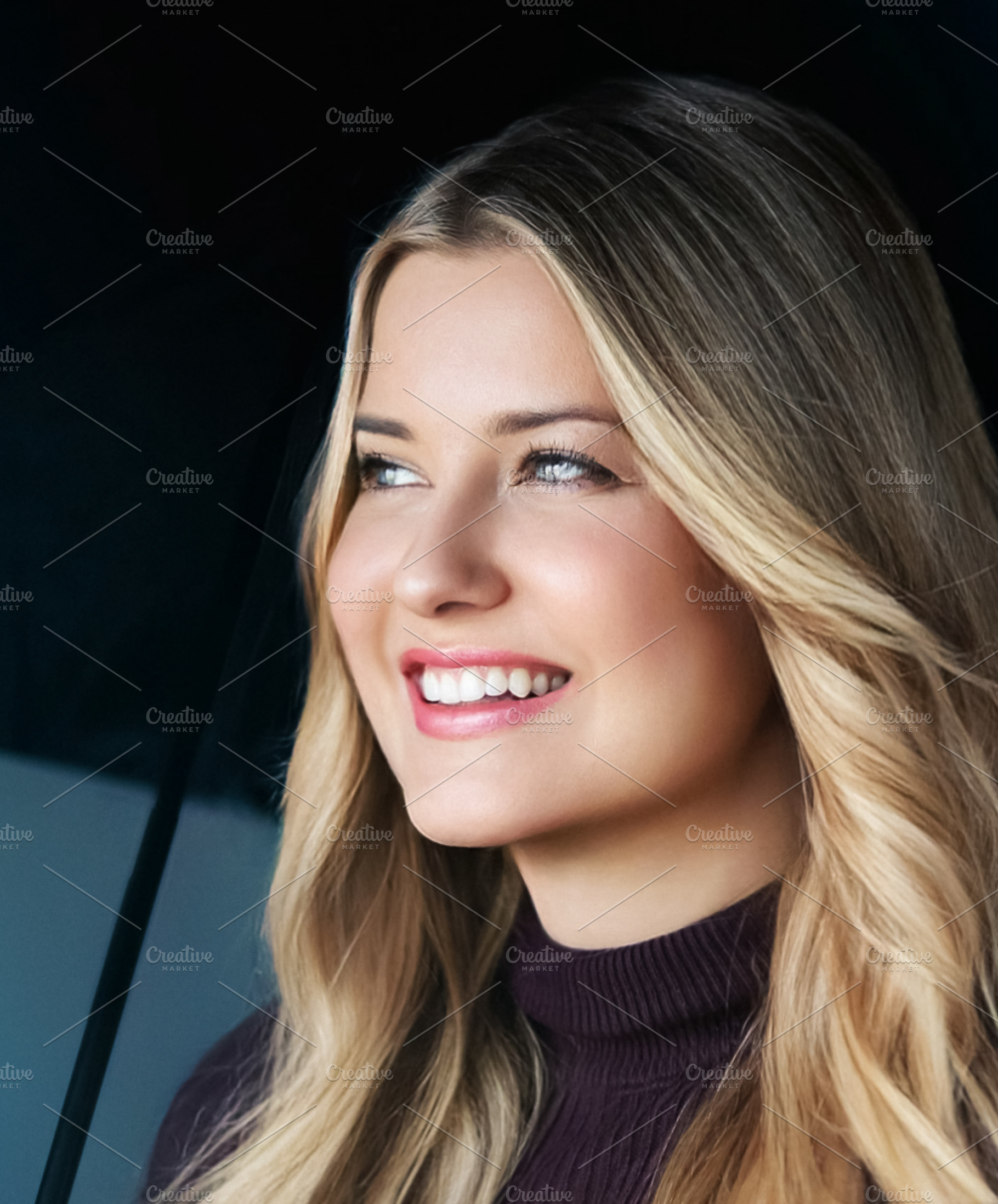 Blonde woman with blue eyes smiling, looking away with a happy a, a Person Photo by Studio ANNA