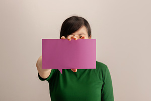 Woman holding a blank square card, communication, identity, mess, a Photo by salmon.black